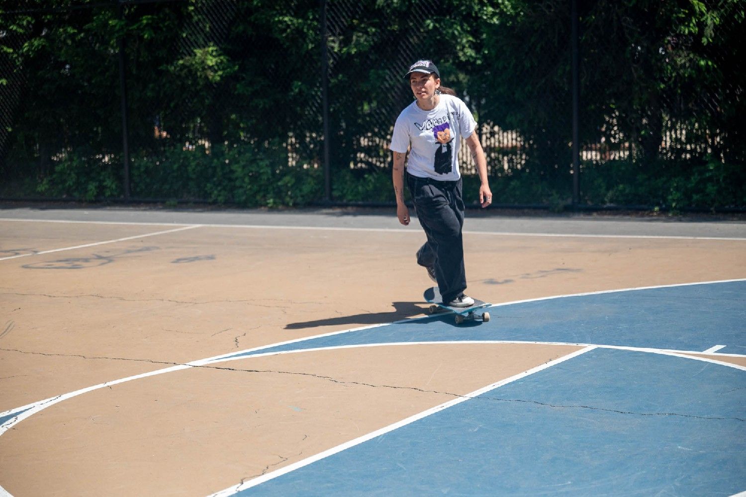 Gurary pushes off from her left foot while on her board.