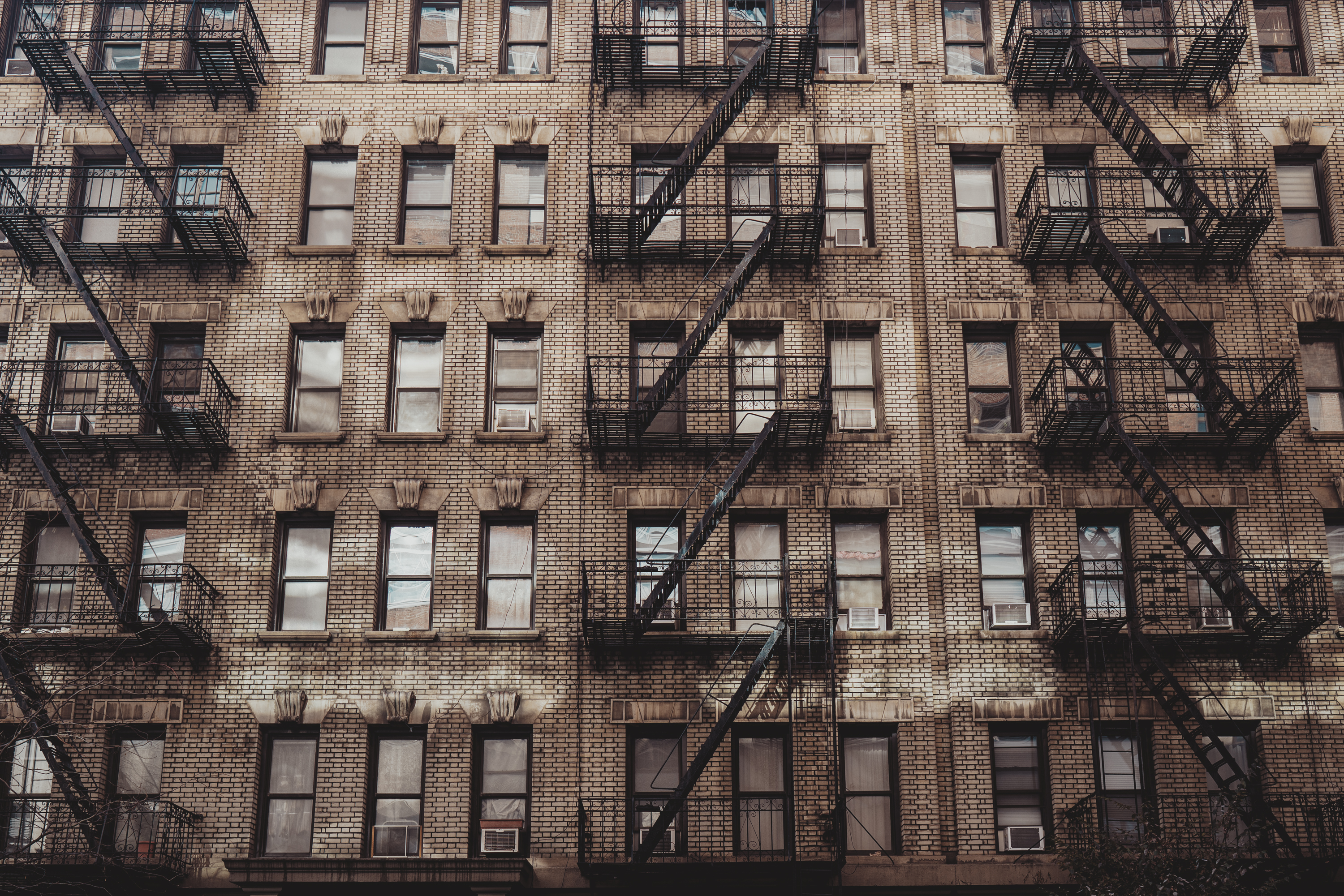 A close-up of a row of apartment buildings.