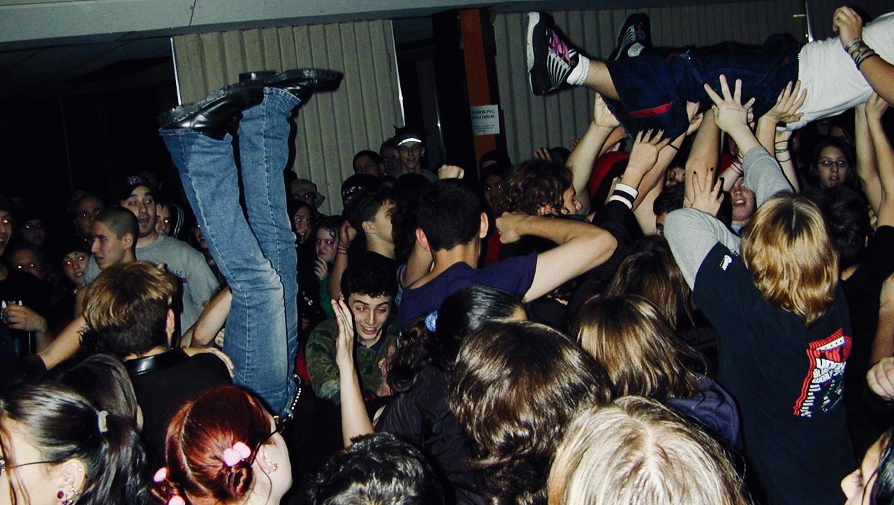 Limbs fly in the mosh pit at the Punk Temple.