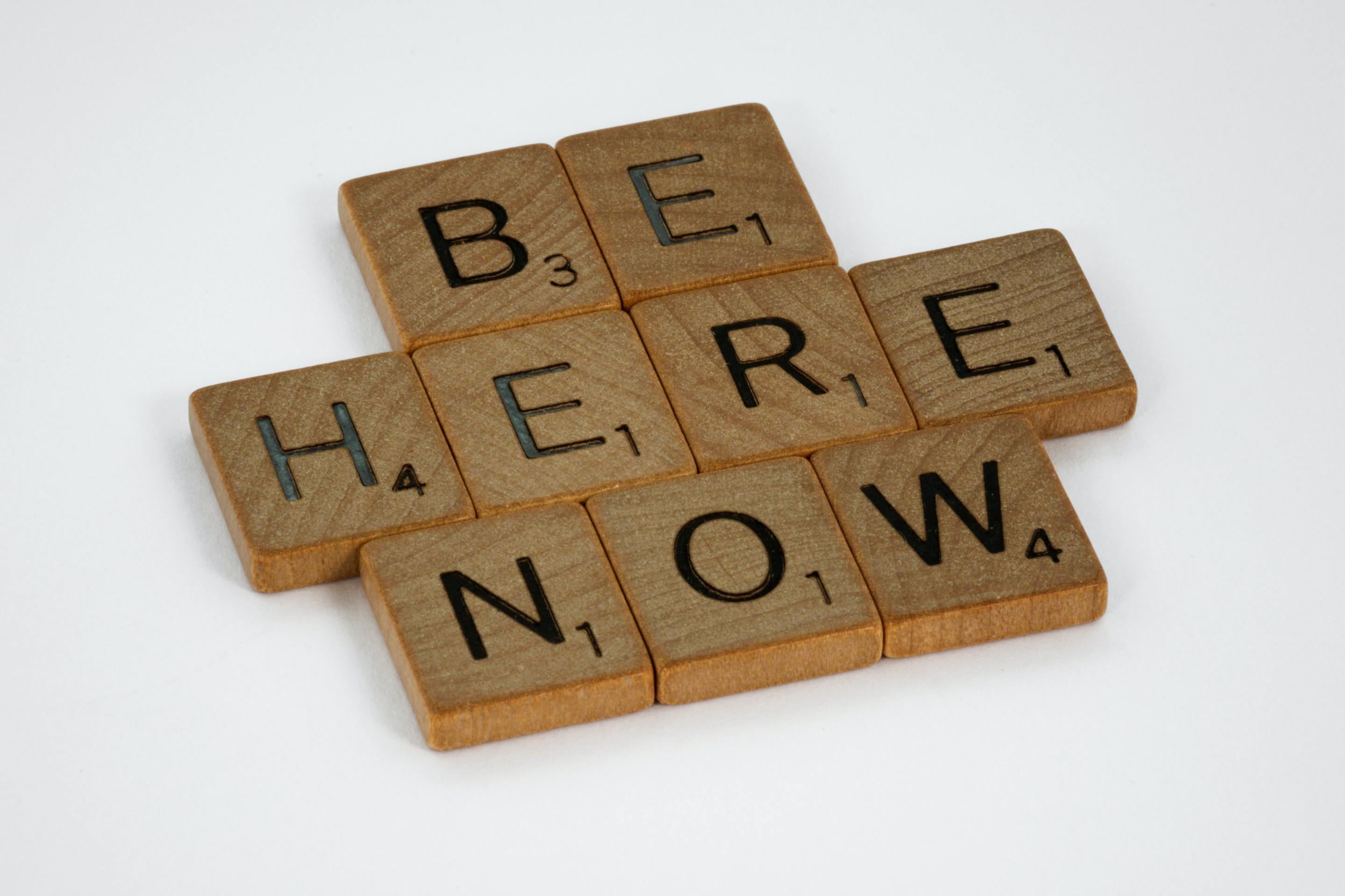 Be Here Now spelled out in Scabble letters