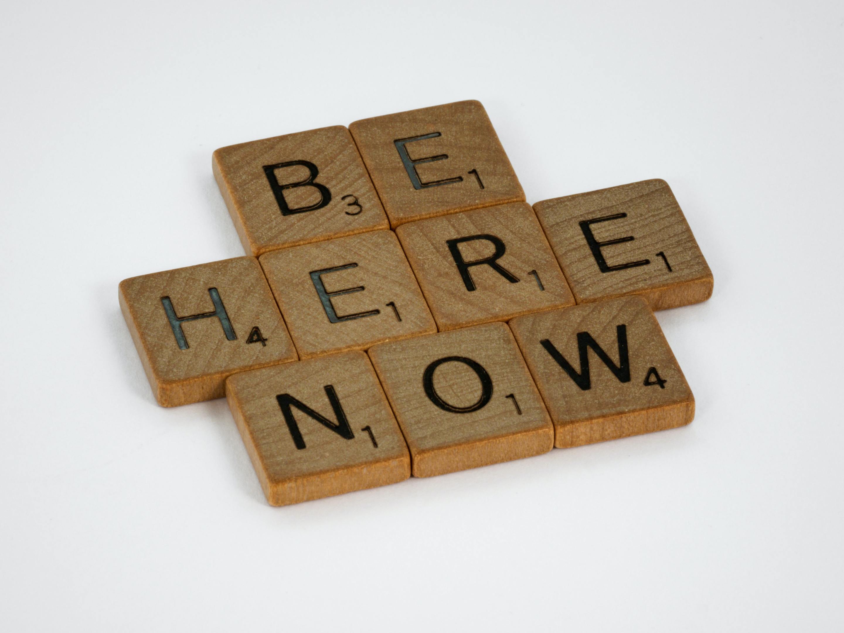 Be Here Now spelled out in Scabble letters