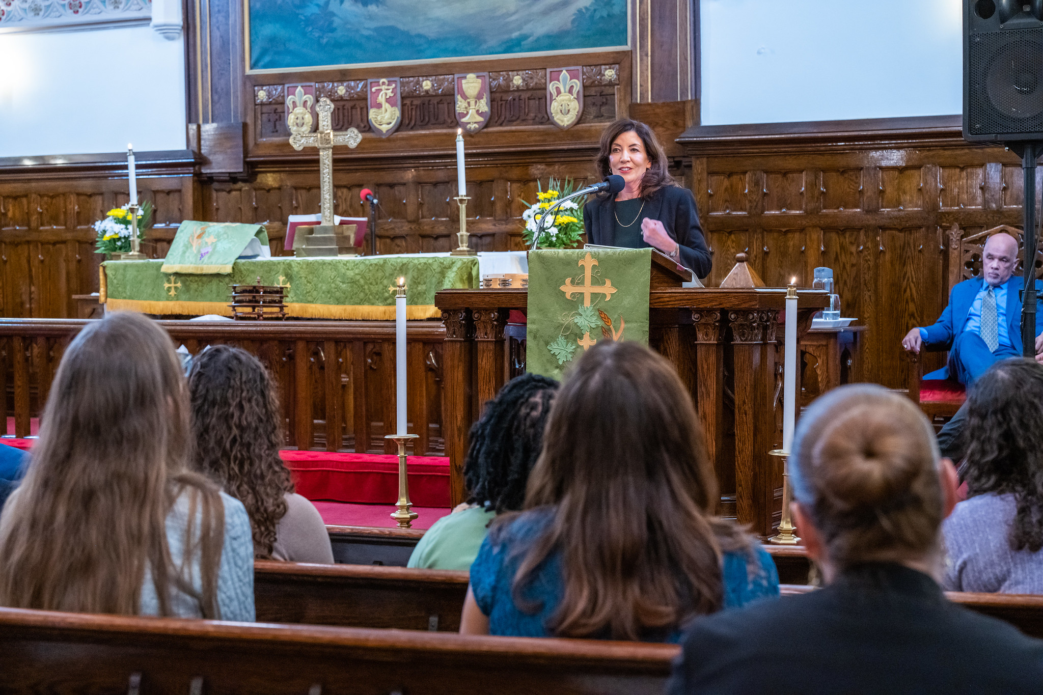 Gov Hochul speaks from the pulpit at the Trinity Lutheran Church on Sunday.