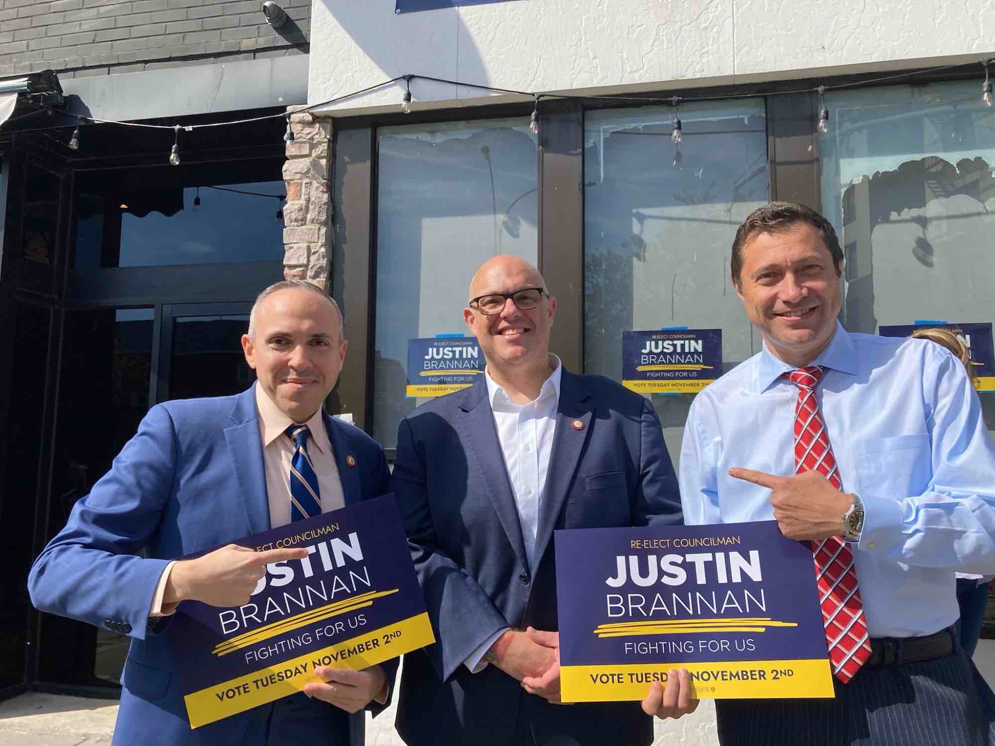 then-Council candidate Ari Kagan endorsing Justin Brannan outside Brannan's Bay Ridge campaign office in 2021. Also with him is Coney Island Councilman Mark Treyger, whose seat Kagan won.