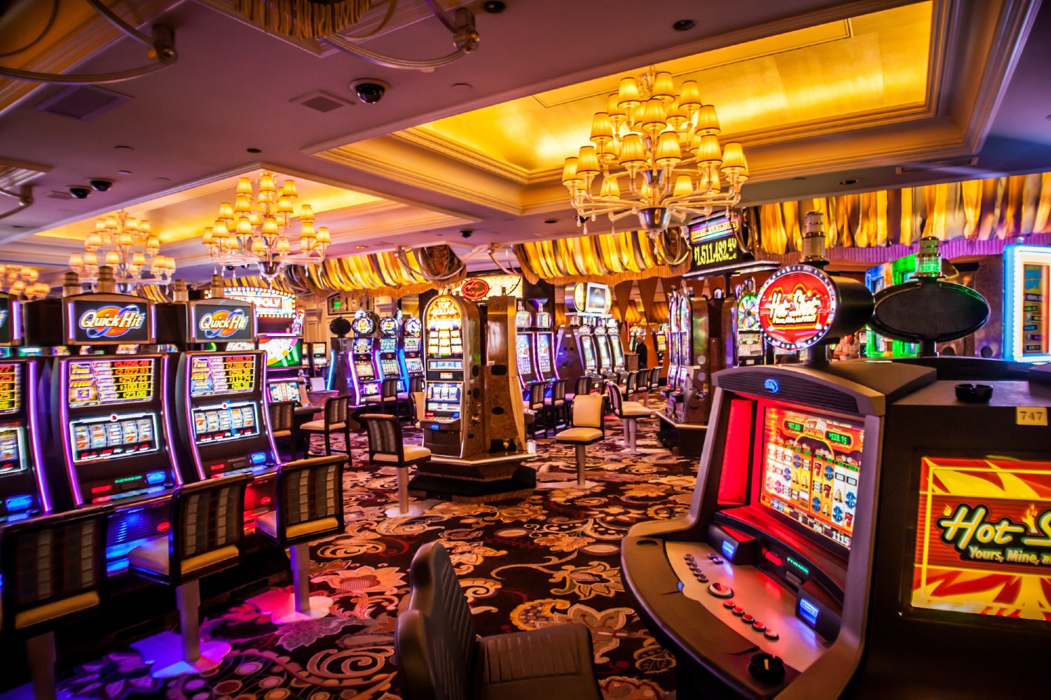 A Las Vegas casino floor filled with empty slot machines.