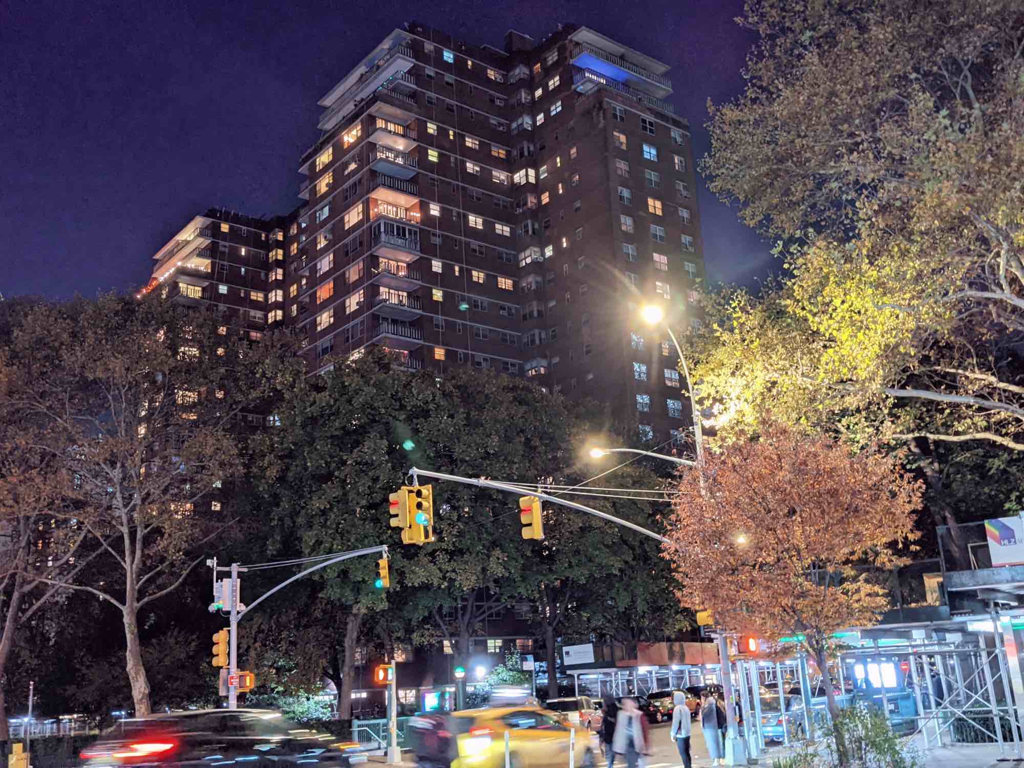 A view of the Penn South Mitchell-Lama apartments in Chelsea at twilight from the street.