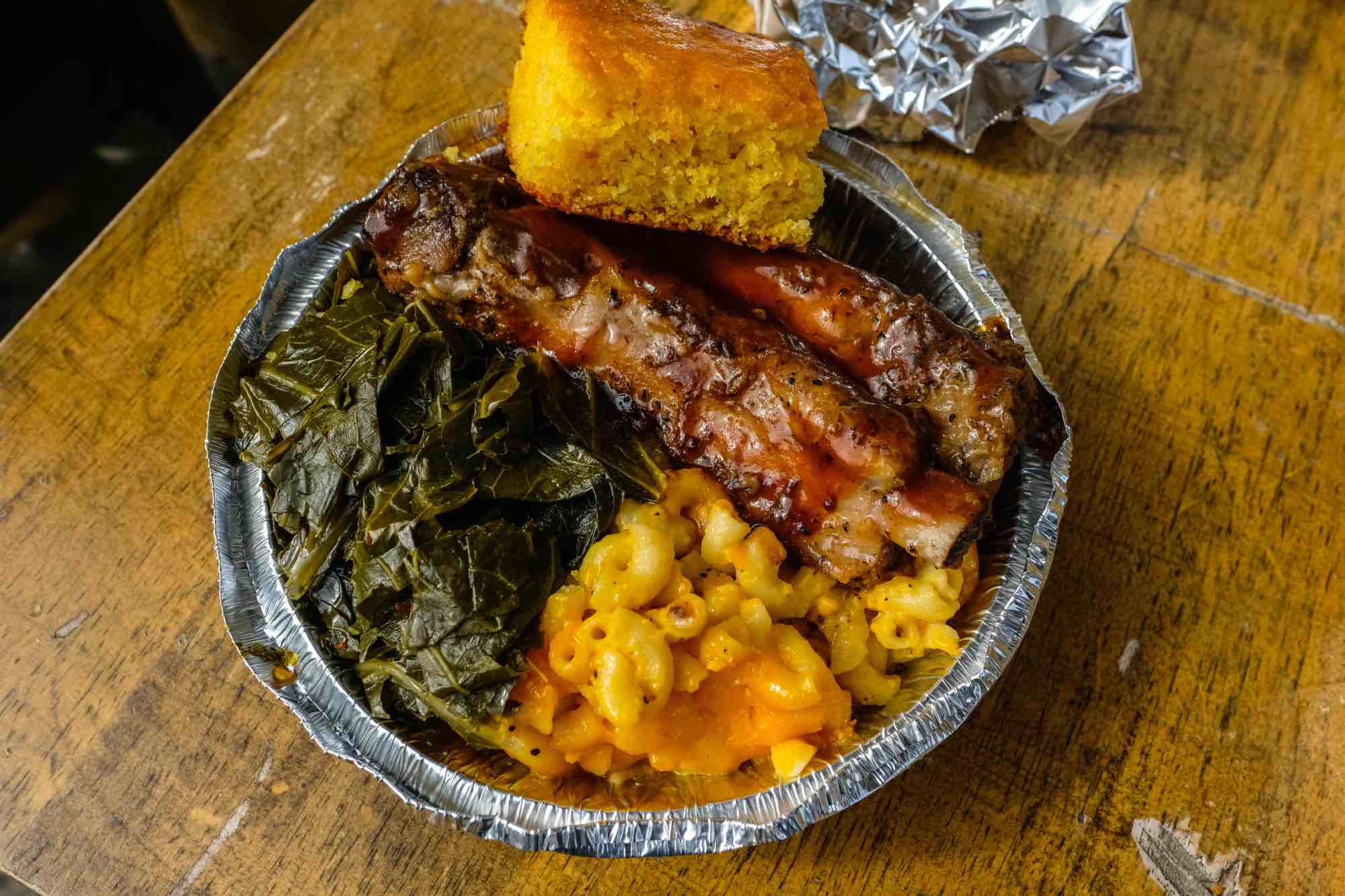 The small BBQ rib dinner with mac and cheese, collard greens, and cornbread, $12