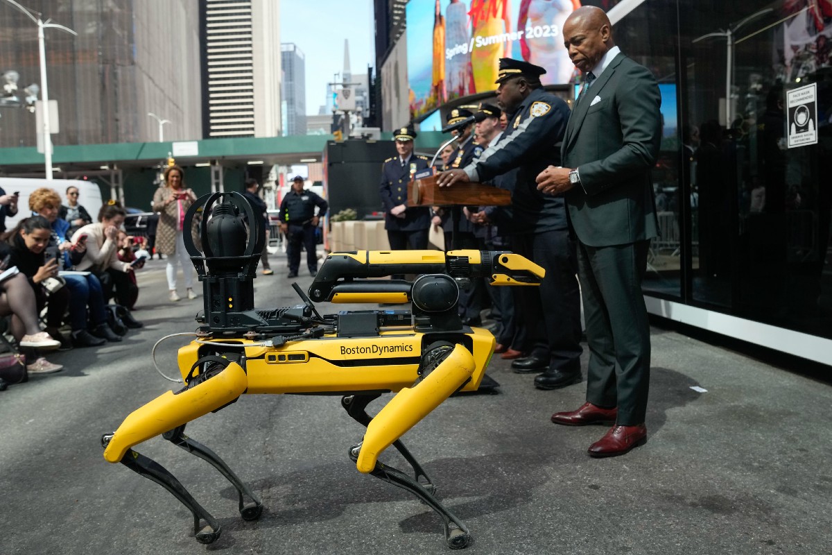 Mayor Eric Adams checks out one of Boston Dynamics's "Digidogs," purchased by the NYPD.