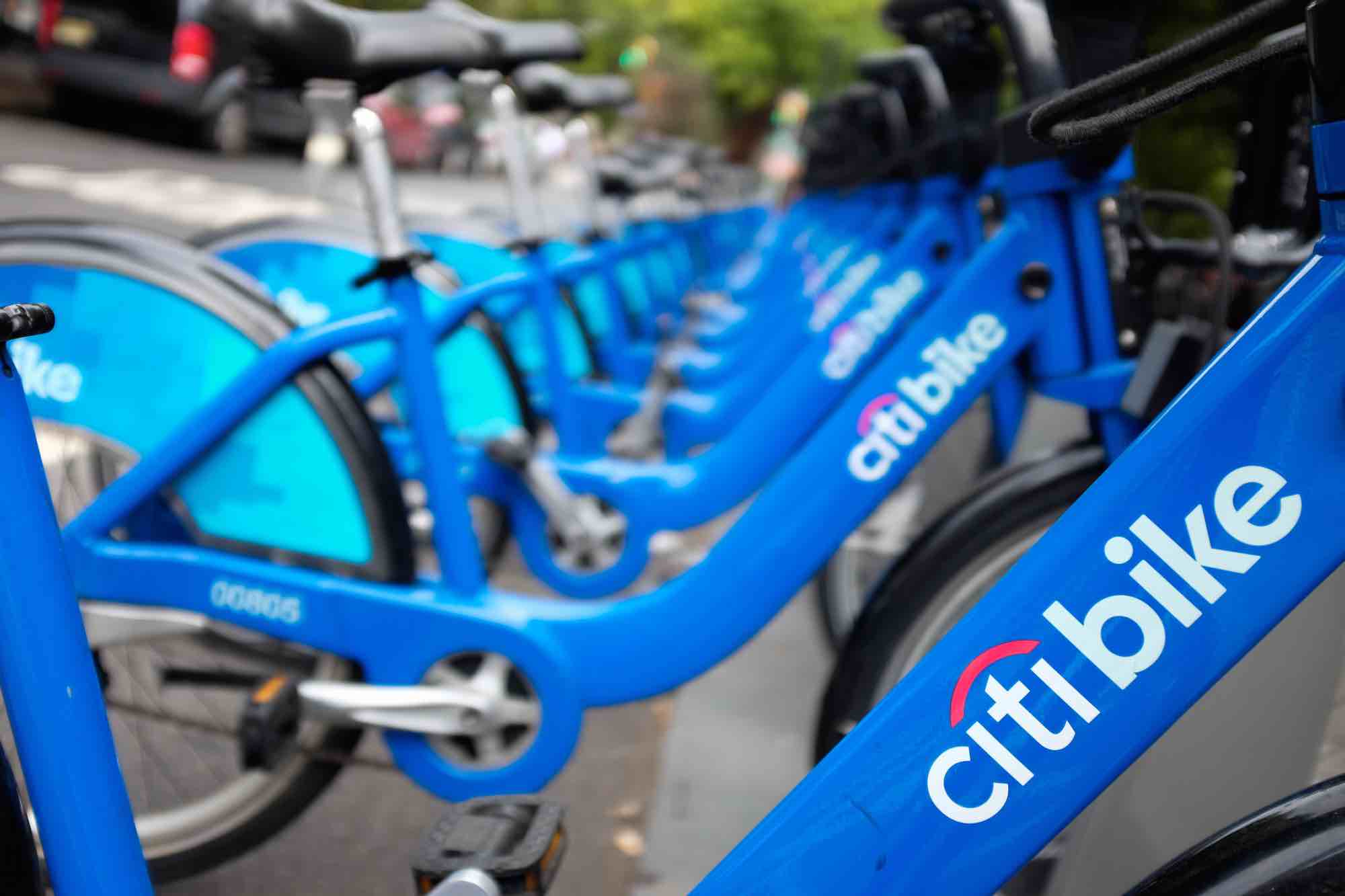 A row of blue Citi Bikes.
