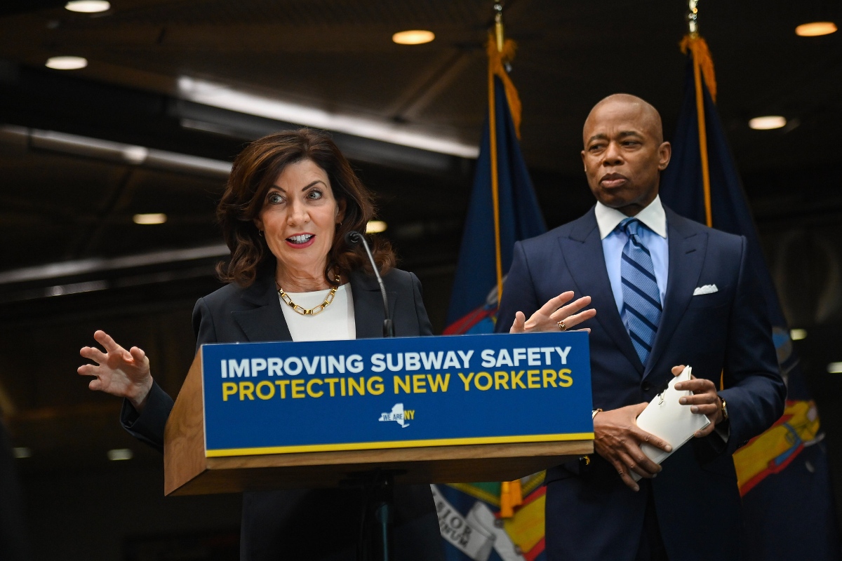 NYC Mayor Eric Adams and NY Governor Kathy Hochul speaking at a press conference.