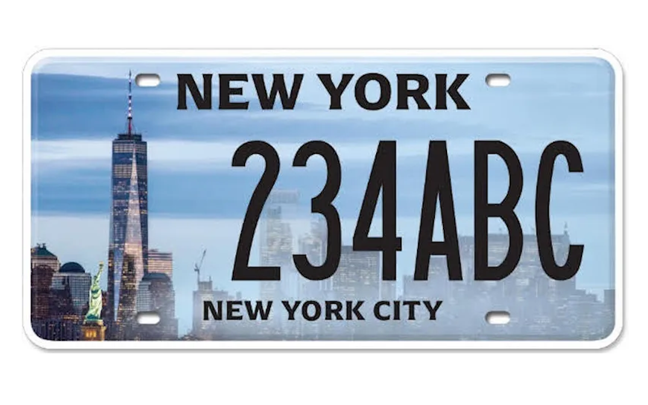 A new license plate unveiled by the DMV, featuring One World Trade Center, a tiny Statue of Liberty, and a miasma over some seemingly random buildings.
