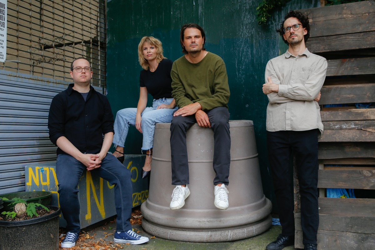 Emanuel Maiberg (black shirt), Jason Koebler (green shirt), Joseph Cox (tan shirt), Samantha Cole (blue jeans), co-founders of 404 Media.
