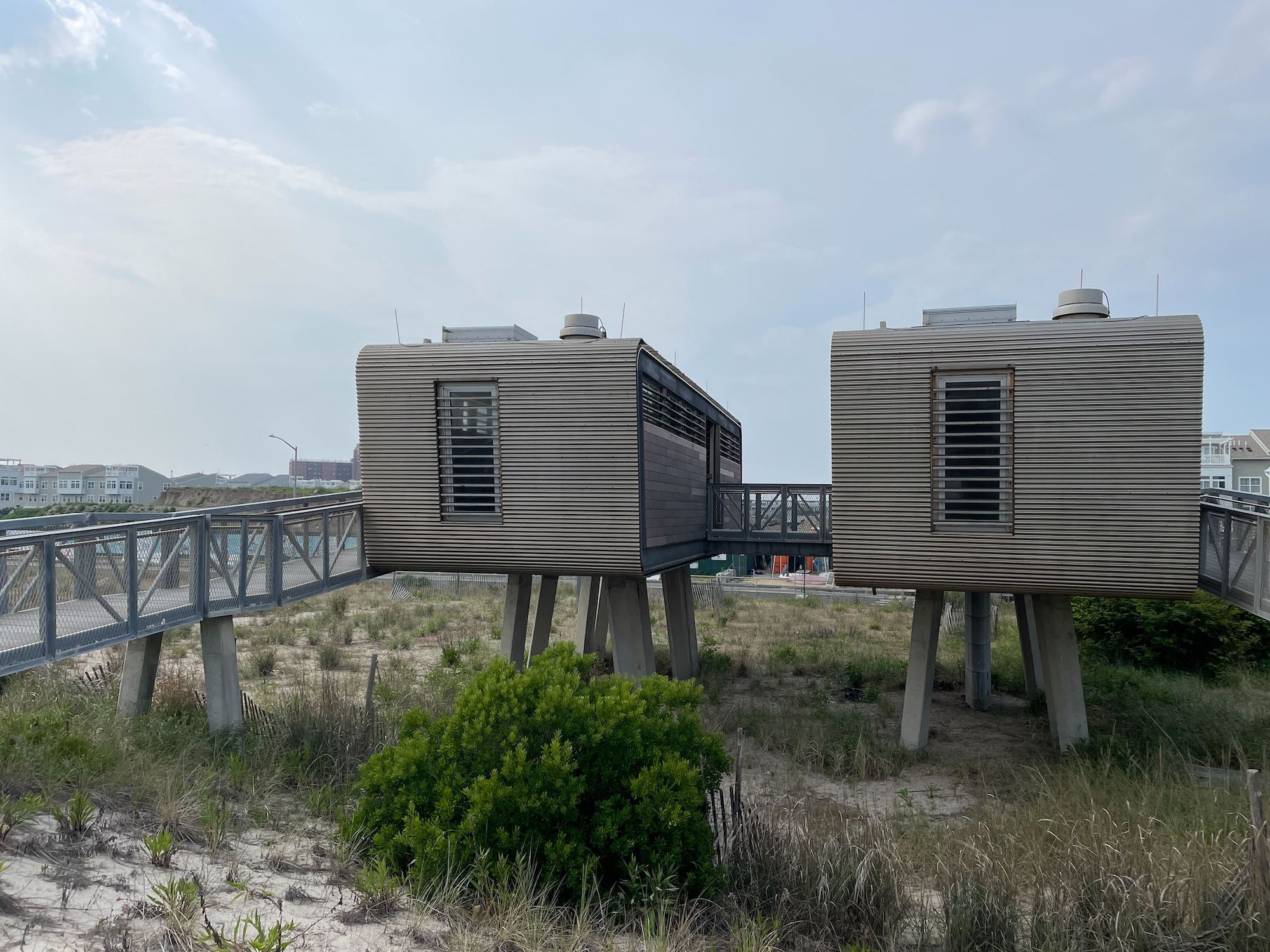 Modular restrooms rise above the sand dunes in the Rockaways.