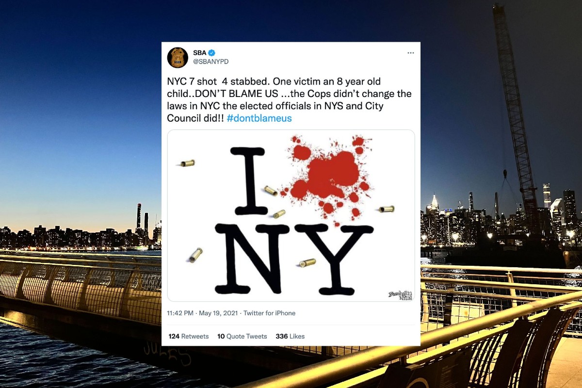 A tweet from the Sergeants Benevolent Association superimposed on the New York City skyline at night.