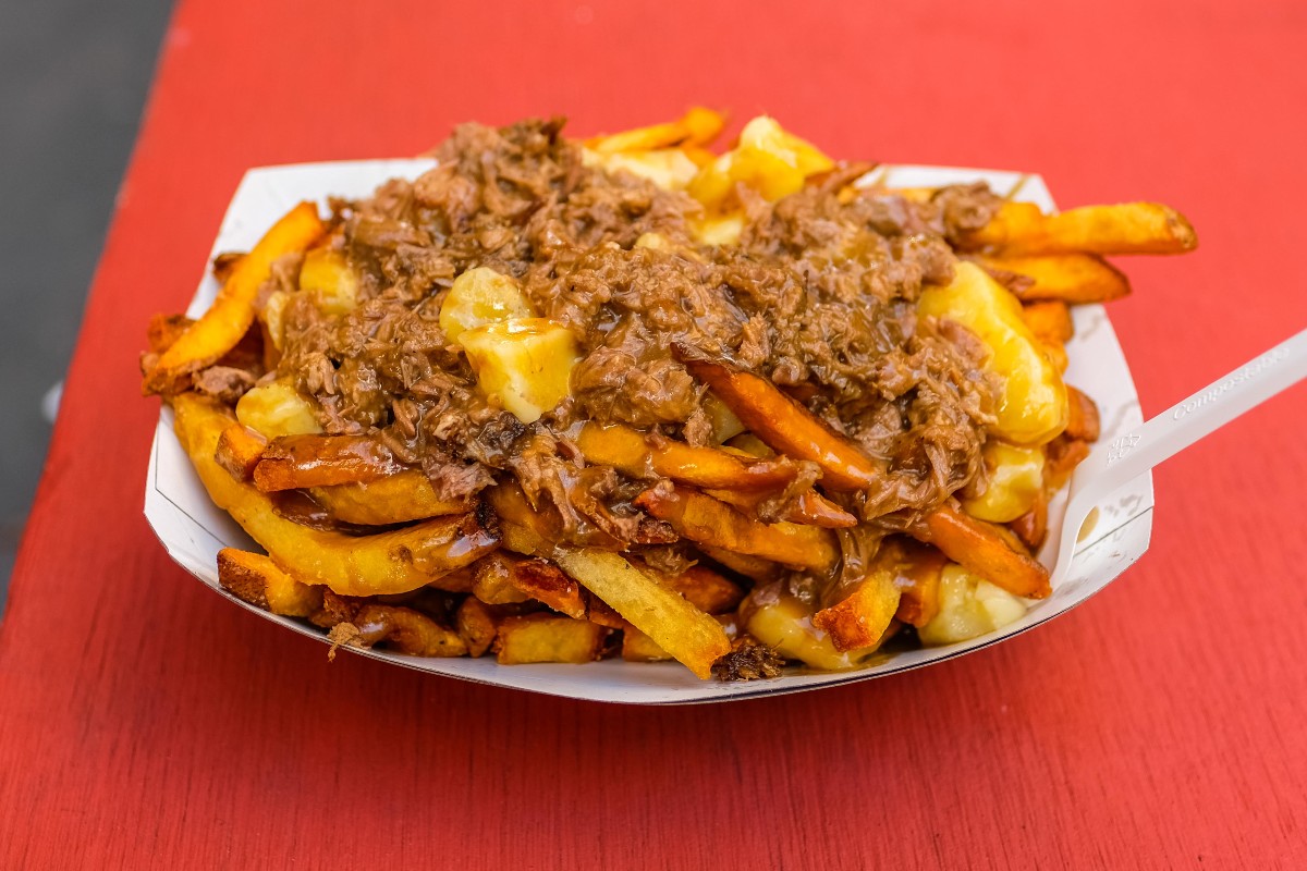 Fries topped with poutine and duck confit from Duck Season in New York City.