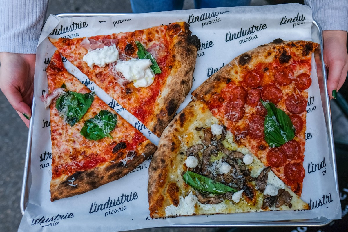 Four slices of pizza from L'Industrie in the West Village.