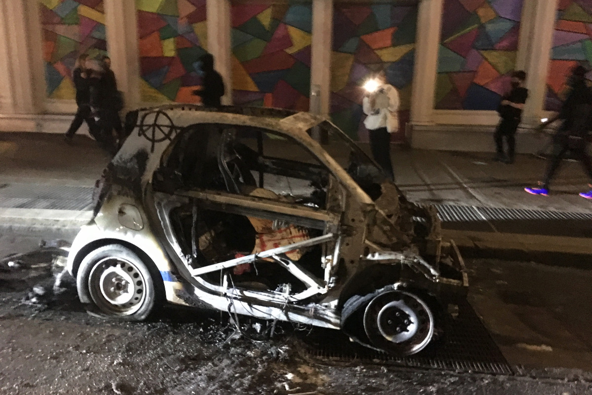 Burned-out mini car in SoHo.