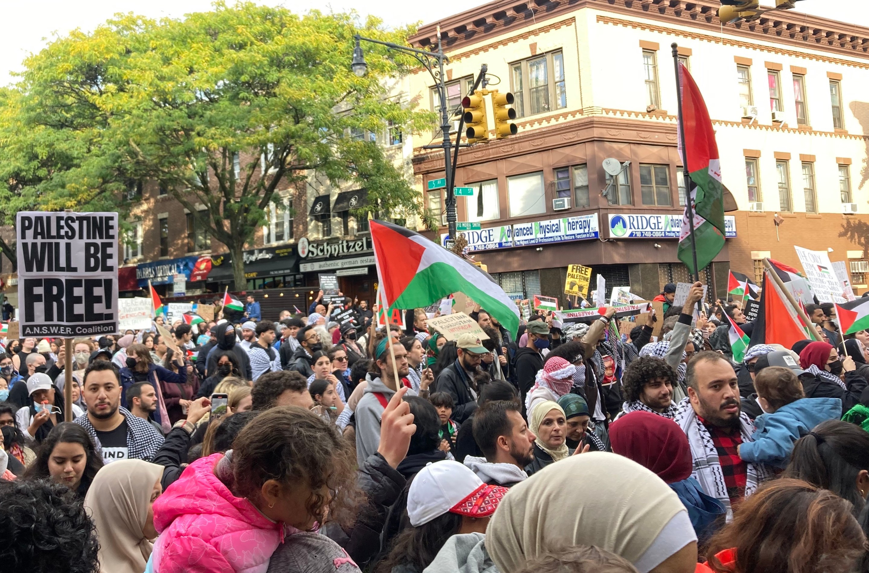 Pro-Palestinian protesters crowd an intersection in Bay Ridge last month.