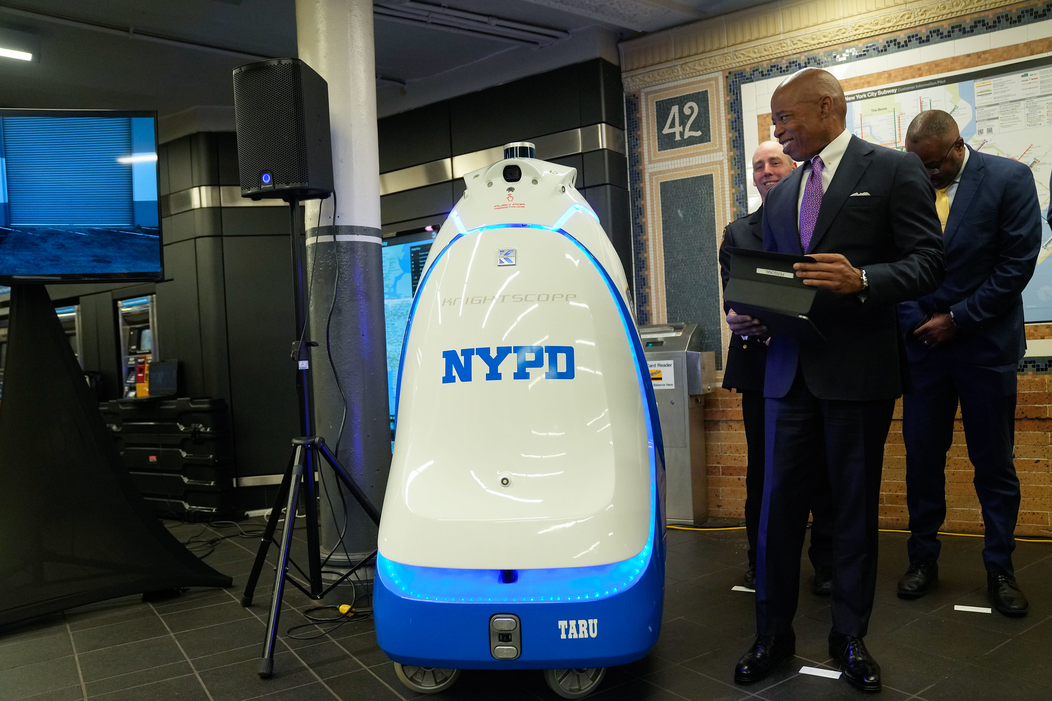Mayor Adams looks lovingly at the K5 robot when it was unveiled in the subway system in September of 2023.
