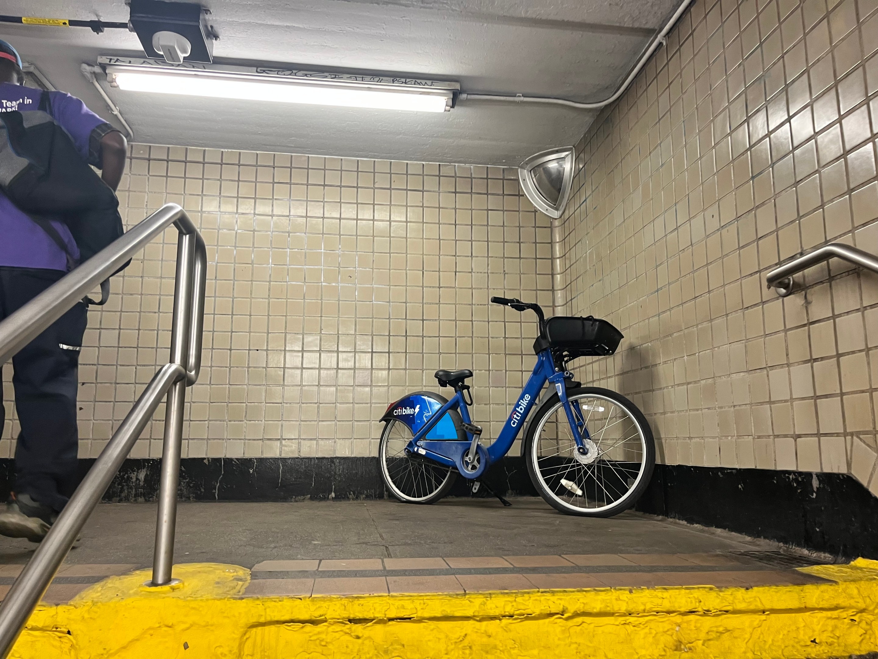 A lone Citi Bike in the subway.