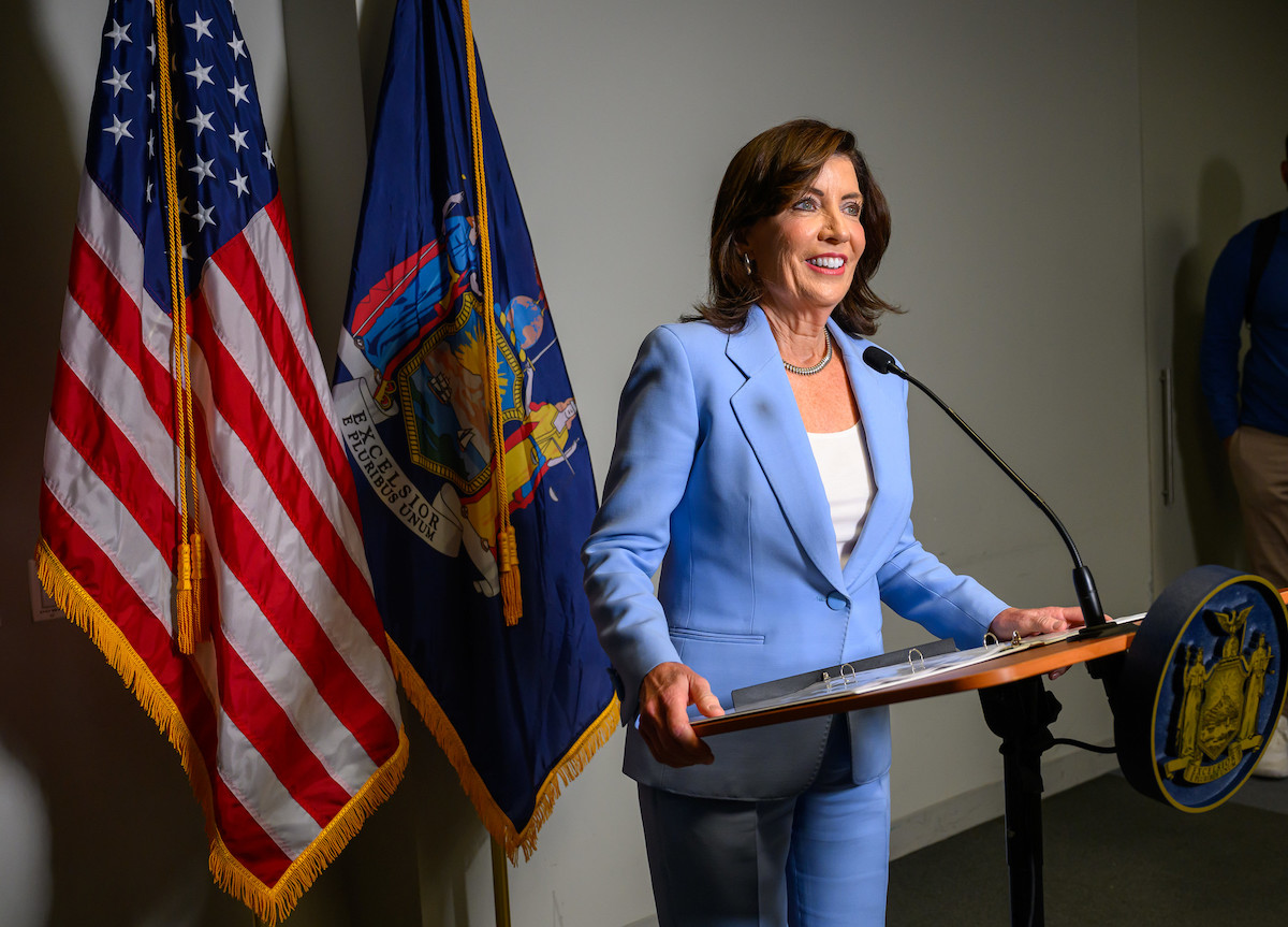 Hochul at a podium wearing a light blue suit on June 20, 2024.